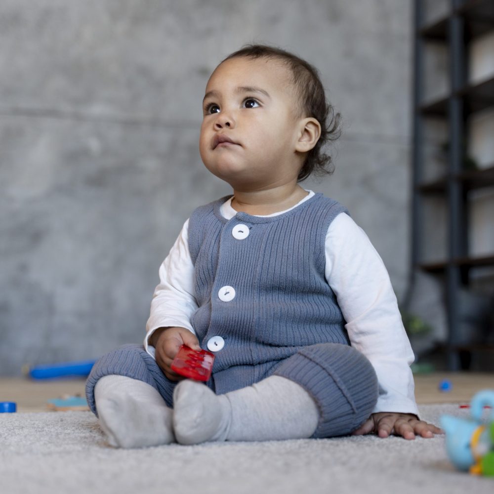 cute-baby-playing-floor-with-toy